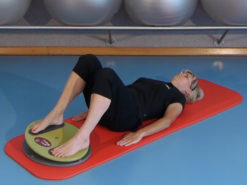 MFT Fit Disc - Übung in Rückenlage